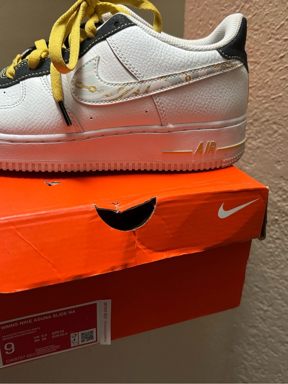 Nike White Low-Top Sneakers with Yellow Accents